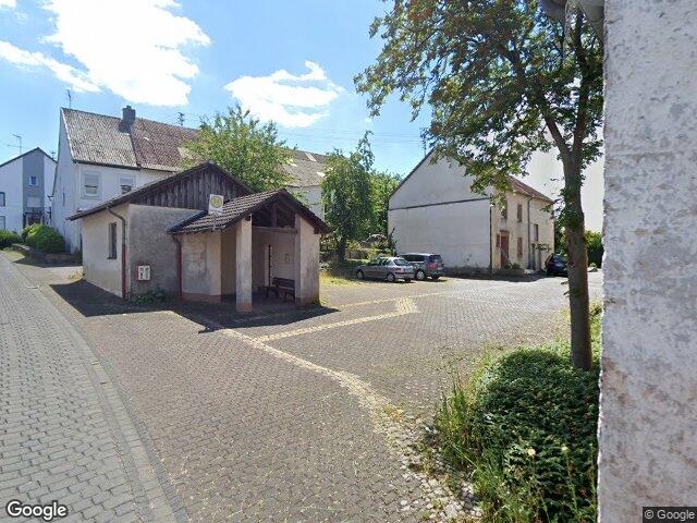 Zwangsversteigerung: Einfamilienwohnhaus (Reihenmittelhaus) und unbebautes Grundstück in Spangdahlem